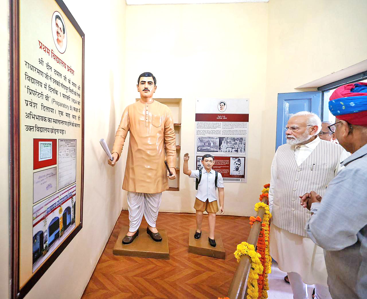 PM Modi having a look at the museum in memory of Deendayal Upadhyaya at Dhankya, Jaipur