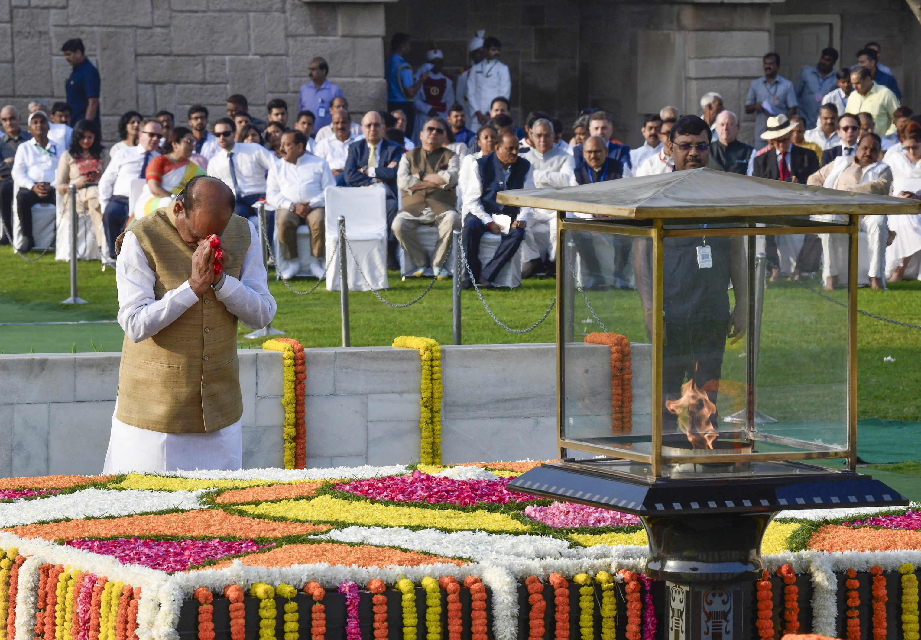 Lok Sabha Speaker Om Birla pays tribute to Mahatma Gandhi at Raj Ghat on Gandhi Jayanti, in New Delhi on Monday. -ANI