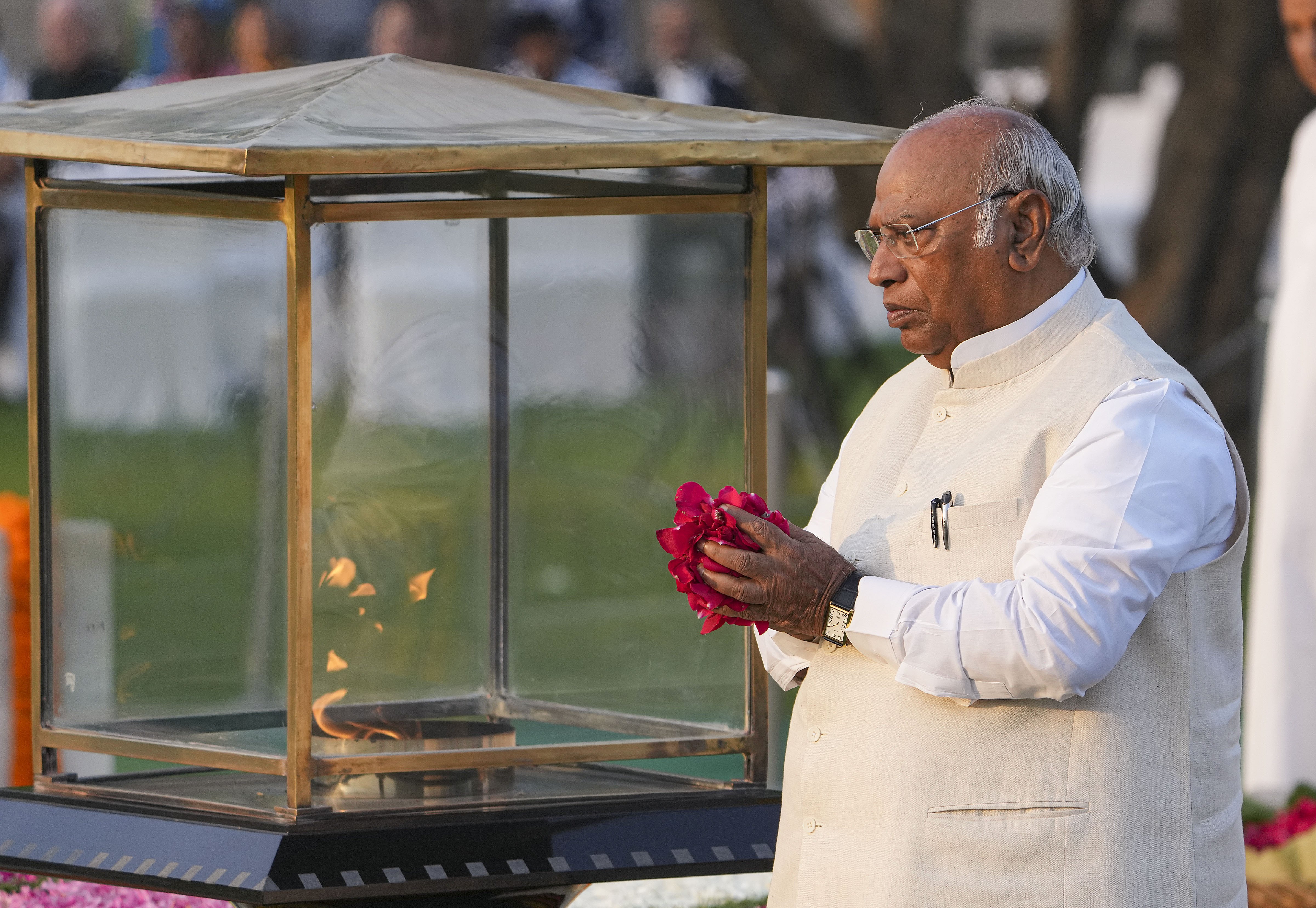 Congress President Mallikarjun Kharge pays tribute to Mahatma Gandhi at Raj Ghat on Gandhi Jayanti, in New Delhi on Monday. -ANI