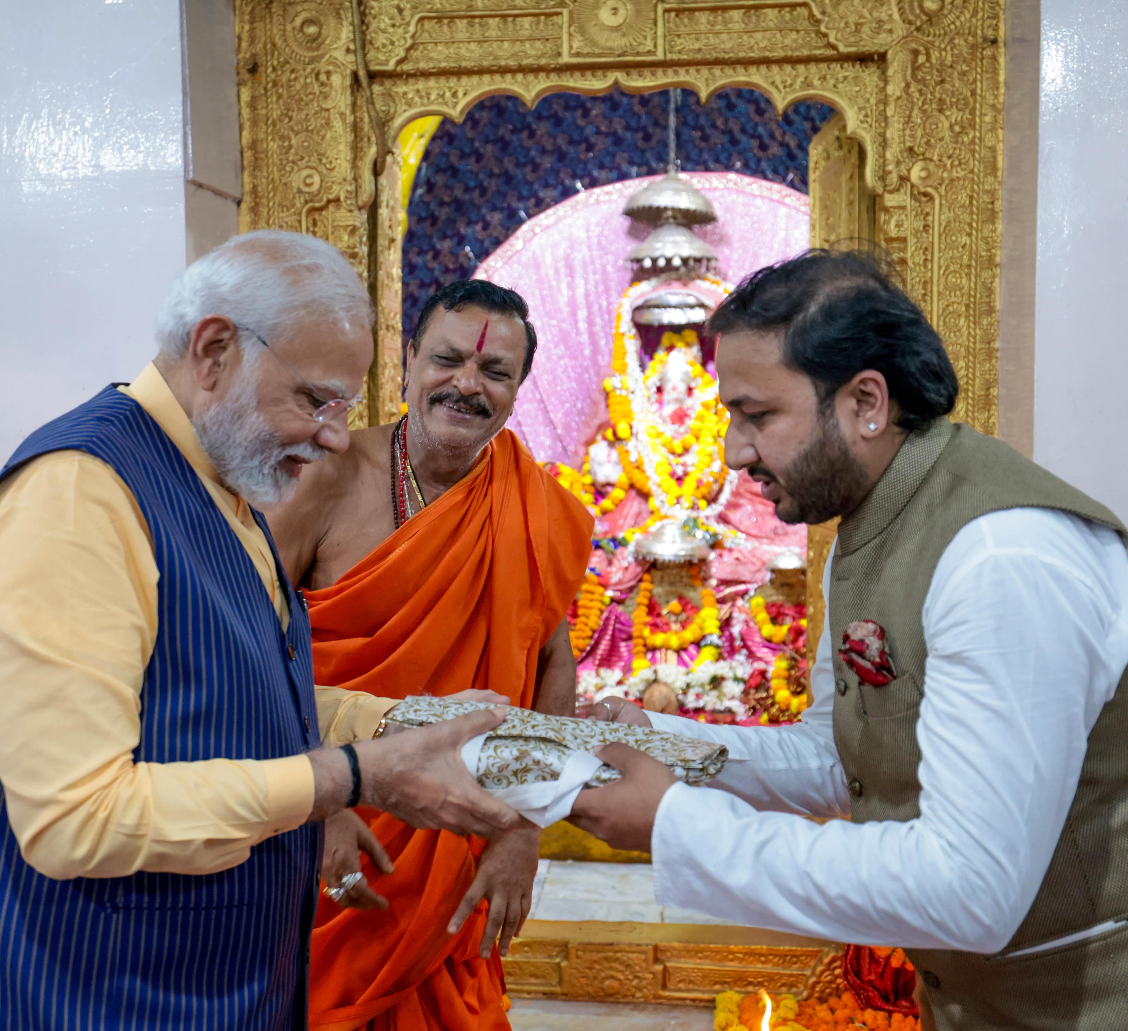 Prime Minister Narendra Modi being felicitated while offering prayers at Danteshwari Temple in Jagdalpur, Chhattisgarh on Tuesday.