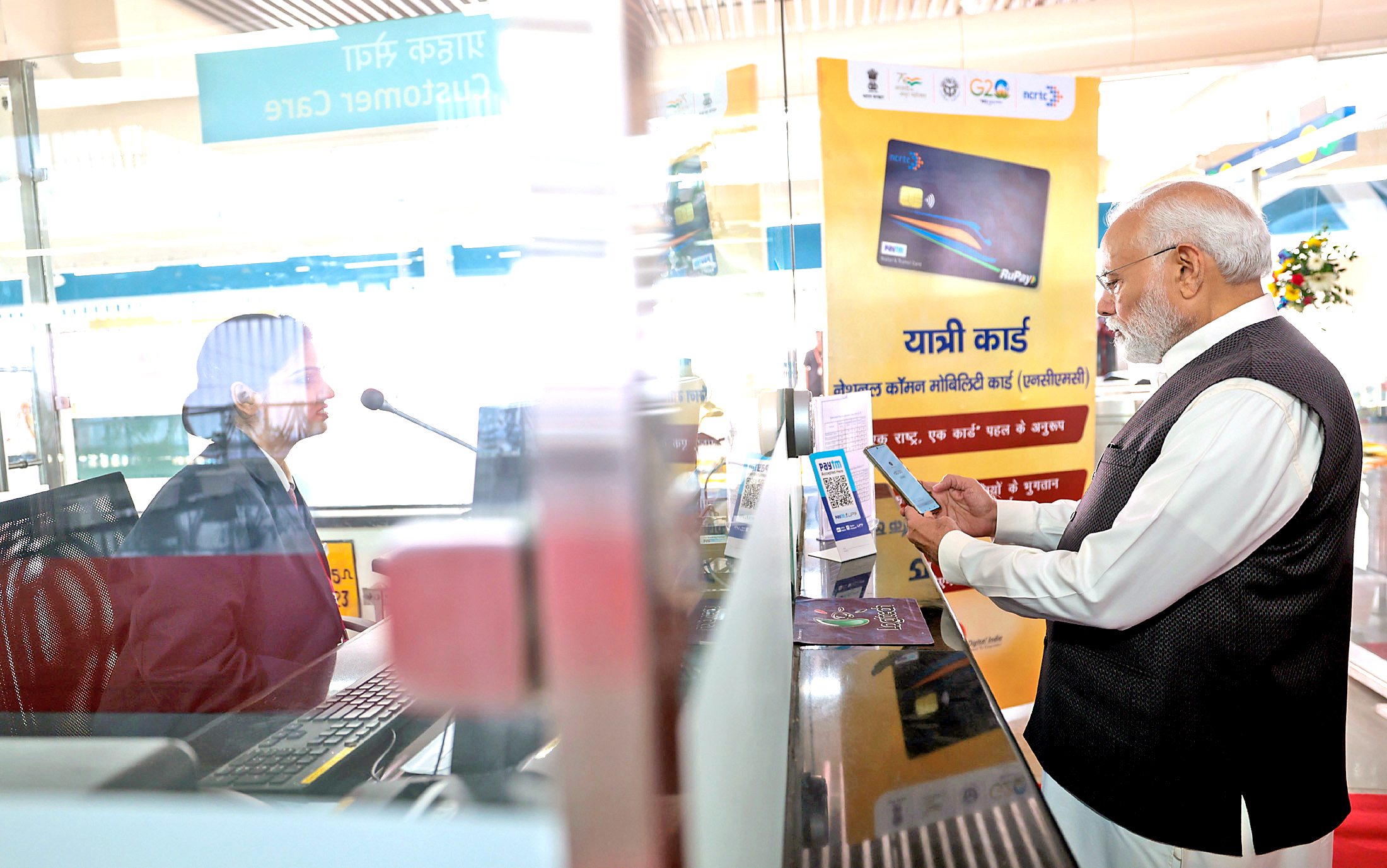 PM Narendra Modi scans QR Code and pays for his ticket via Paytm