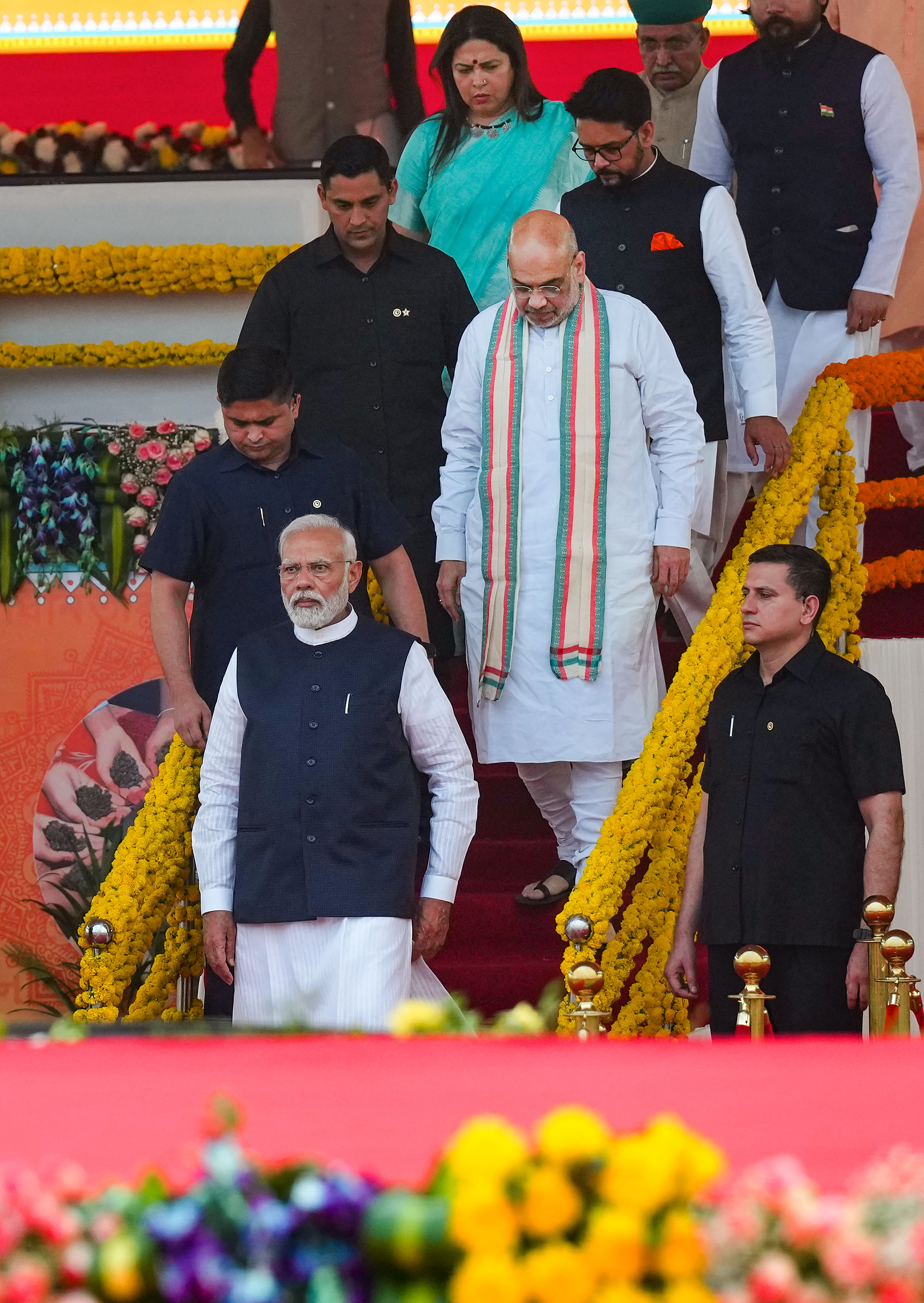 Prime Minister Narendra Modi during an event marking the culmination of the 'Meri Maati Mera Desh' campaign, in New Delhi, on Tuesday. Union Ministers Amit Shah, Meenakashi Lekhi and Anurag Thakur are also seen. -PTI