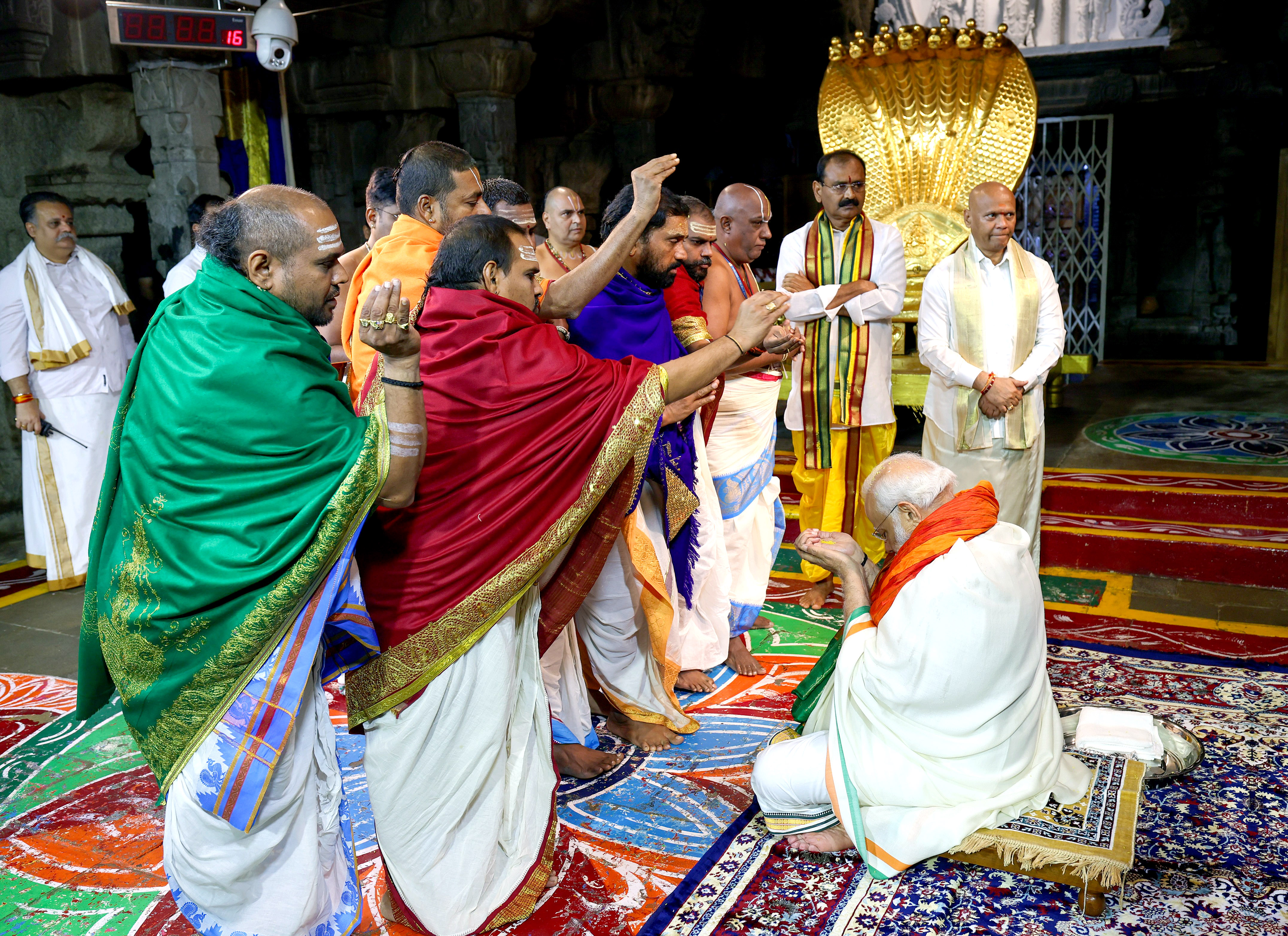 Priests shower vedic blessings on PM Modi.