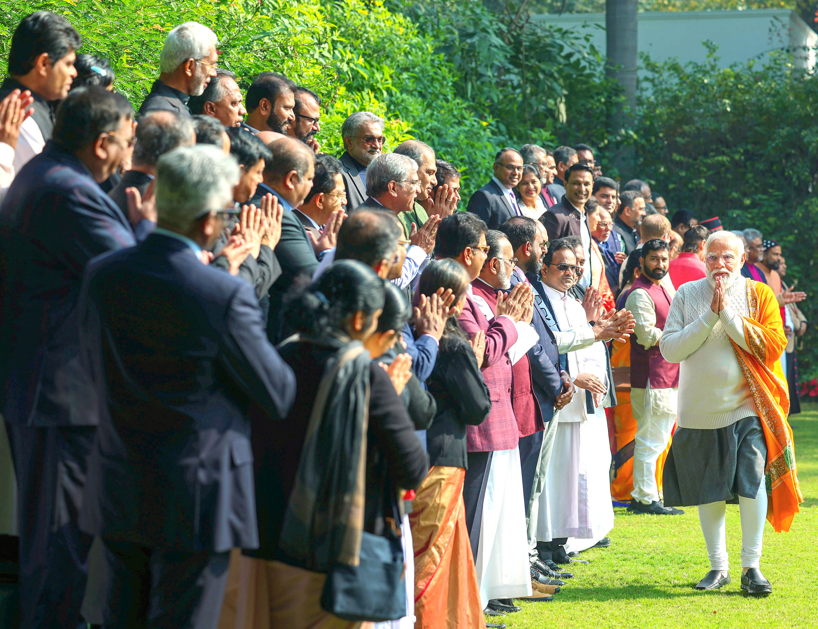PM Narendra Modi being welcomed by Christian community members.