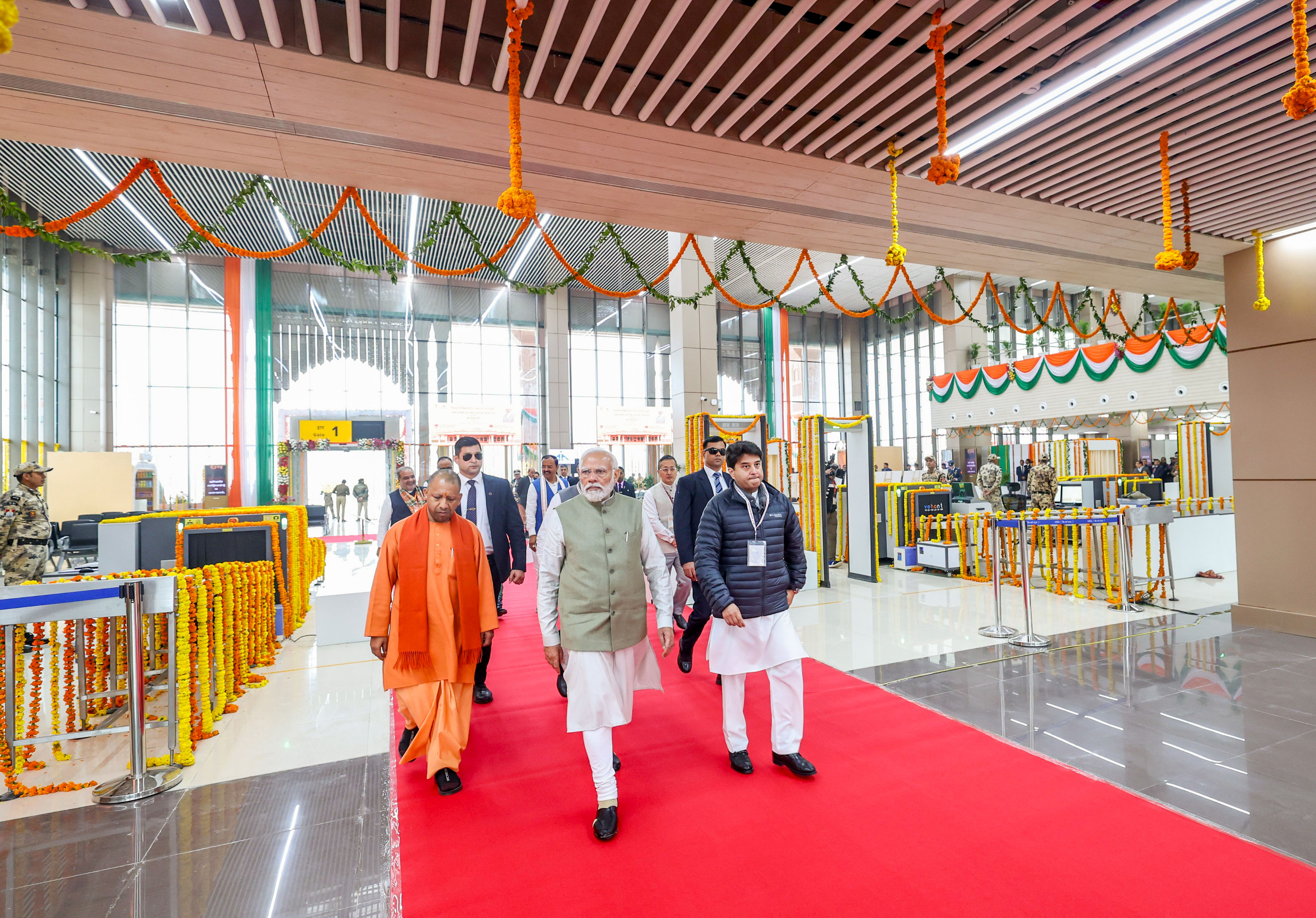 Prime Minister Narendra Modi inaugurates the Maharishi Valmiki International Airport in Ayodhya on Saturday. Uttar Pradesh Chief Minister Yogi Adityanath, Union Minister Jyotiraditya Scindia and others are also seen.