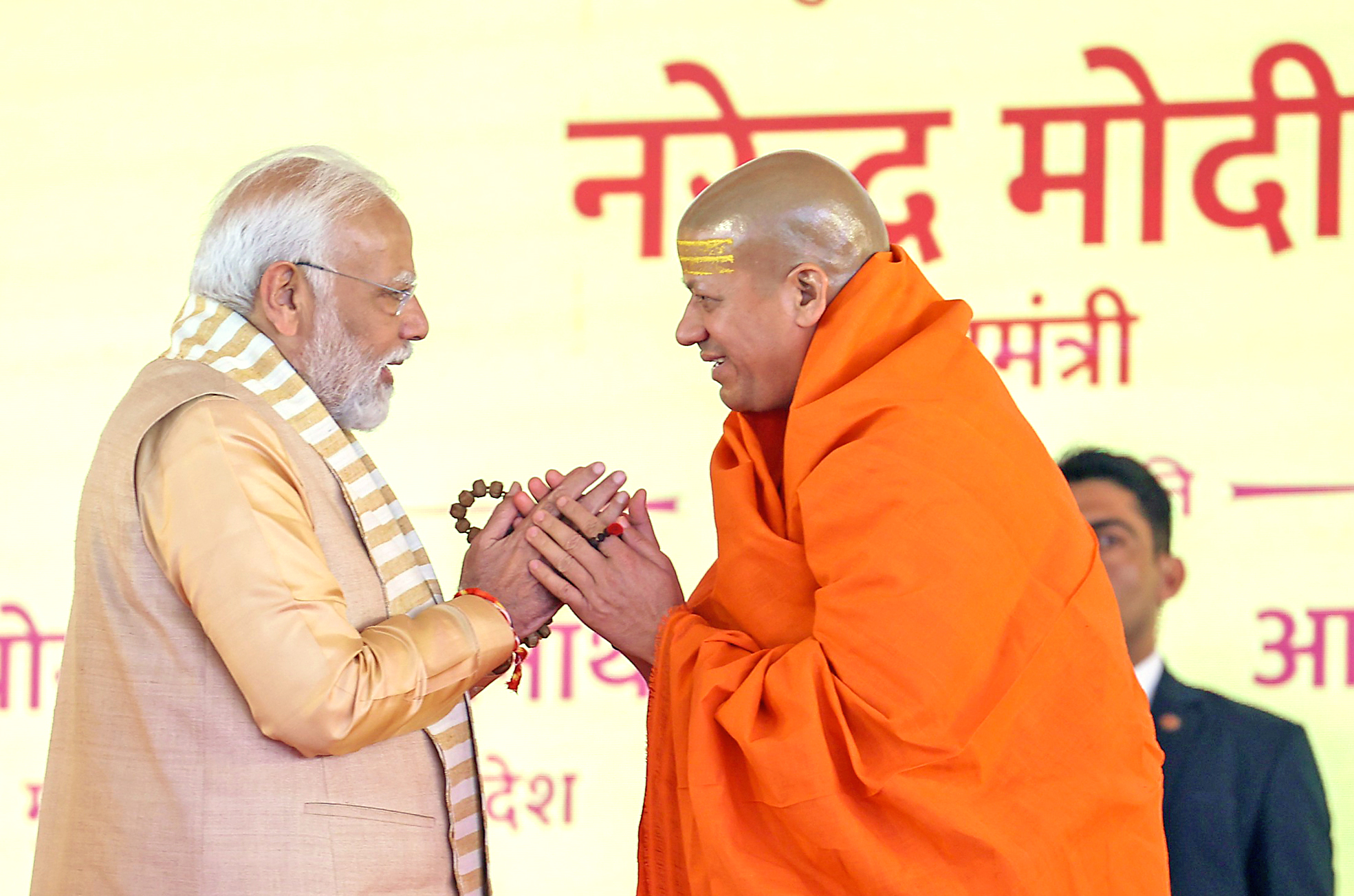 PM Modi pays greets a saint.
